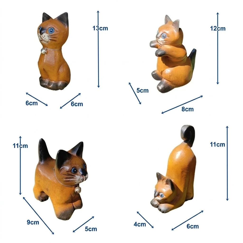 Handcrafted wooden cat figurine in a playful pose