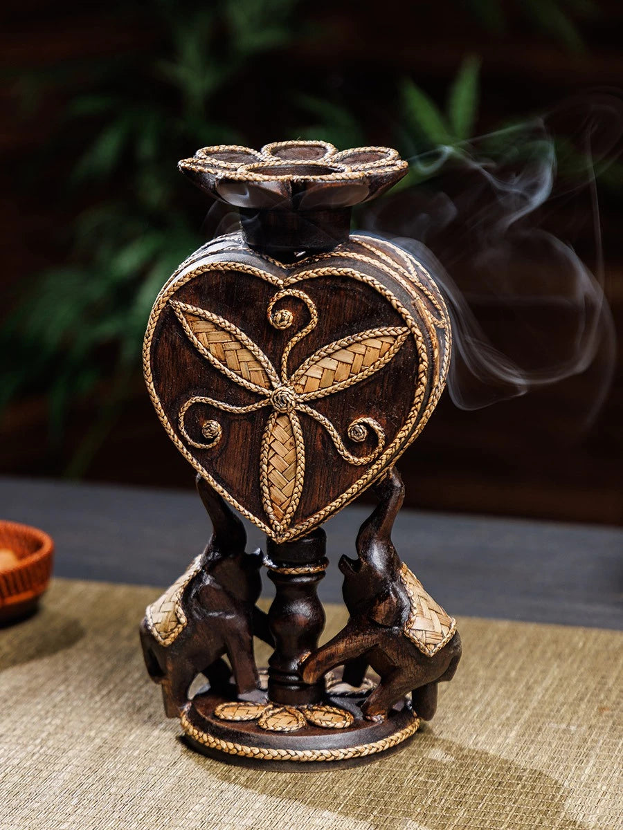Hand-carved 2-in-1 solid wood incense cone burner and tealight candle holder supported by a stable pair of elephants.