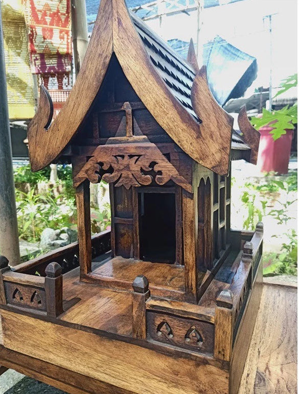 Authentic handcrafted teak wood Thai spirit house