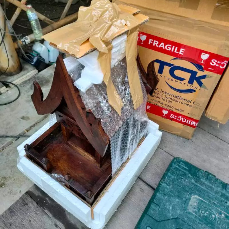 Authentic handcrafted teak wood Thai spirit house