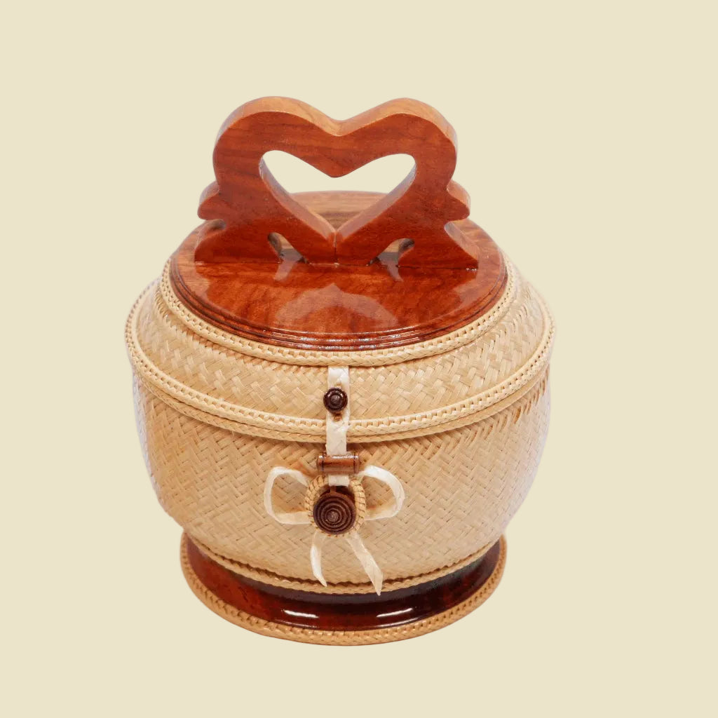 Authentic handwoven bamboo Thai sticky rice basket featuring a carved solid wood heart-shaped lid.