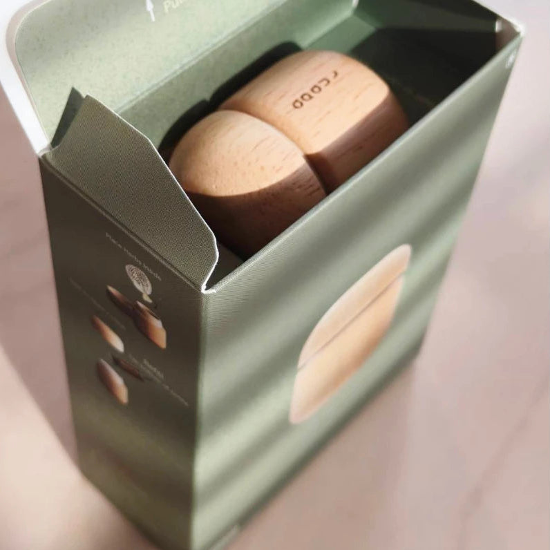 Award-winning minimalist wooden Thai herbal inhaler in a handcrafted jar, professional Thai aromatherapy gift.