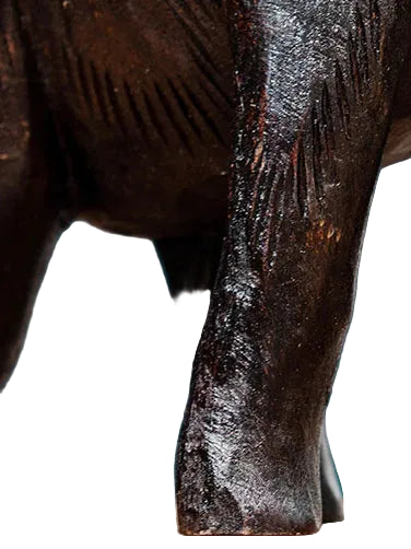 Heavy-duty wooden elephant fruit tray serving centerpiece on a dining table