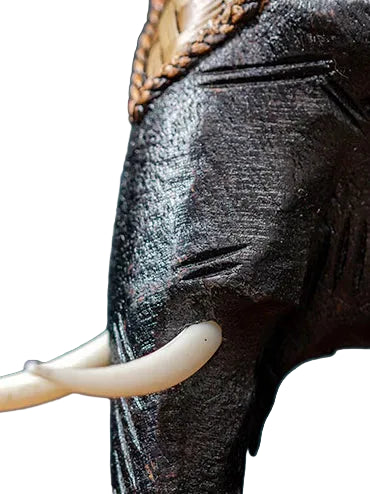 Heavy-duty wooden elephant fruit tray serving centerpiece on a dining table