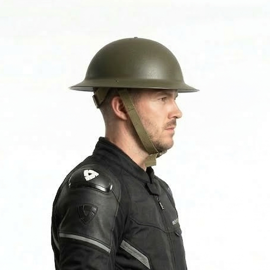 Man wearing an authentic WW2 British Army MK2 Tommy steel helmet replica in olive green.
