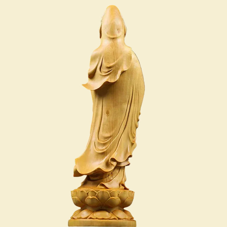 Bring peace to your space with our hand-carved Guanyin statue. Made from premium cypress wood, this Goddess of Mercy figurine is perfect for Feng Shui & Zen decor.