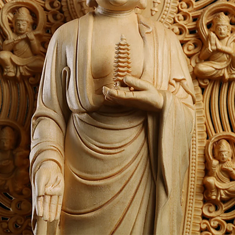 Intricate hand-carved wood details of Medicine Buddha Bhaisajyaguru