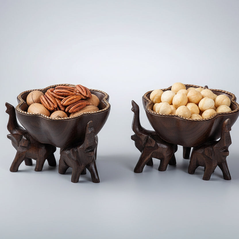 Hand-carved wooden elephant fruit tray with flower-shaped bowl and braided bamboo rim.