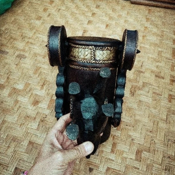 Handcrafted Thai elephant wine bottle holder carved from Rain Tree wood with woven rattan accents, model DC1010, premium tabletop decor.