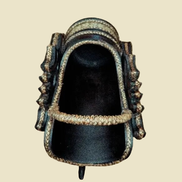 Handcrafted Thai elephant wine bottle holder carved from Rain Tree wood with woven rattan accents, model DC1010, premium tabletop decor.