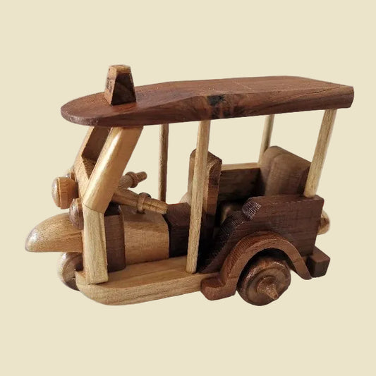 Handcrafted Golden Teak wood Tuk Tuk model with movable wheels, premium Thai wood carving for home decor and collectibles.