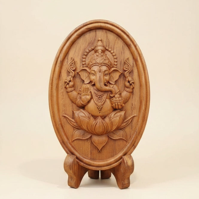 Handcrafted golden teak wood Ganesha statue for home decor