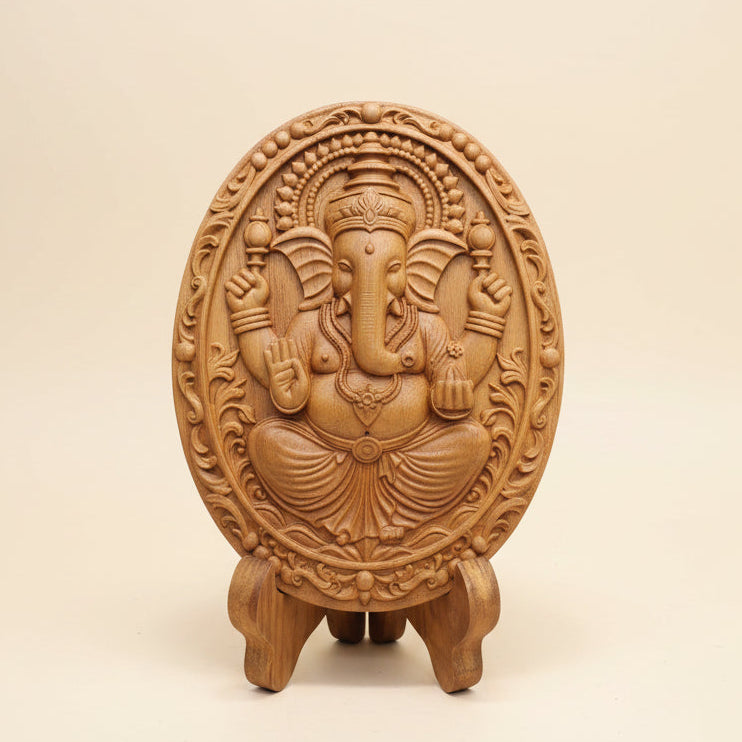 Handcrafted golden teak wood Ganesha statue for home decor