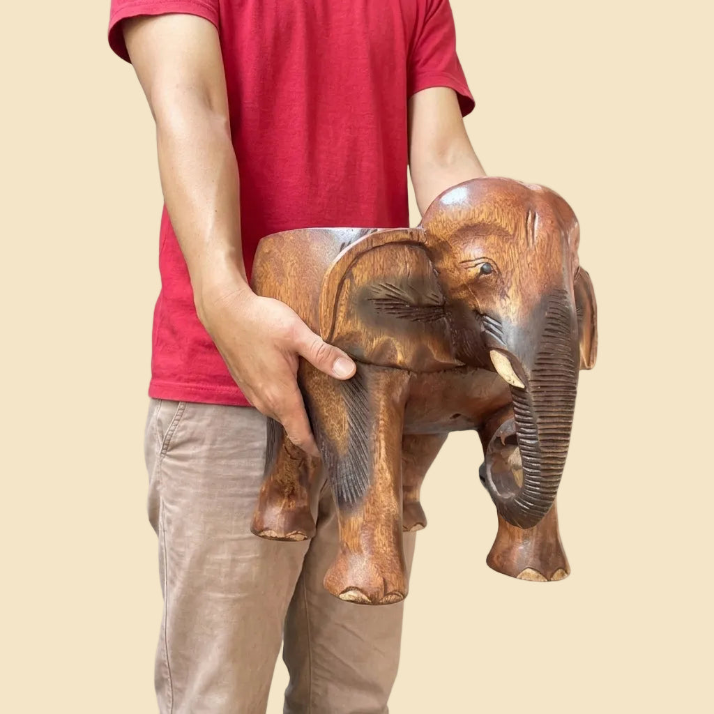 Handcrafted solid wooden elephant stool in dark brown