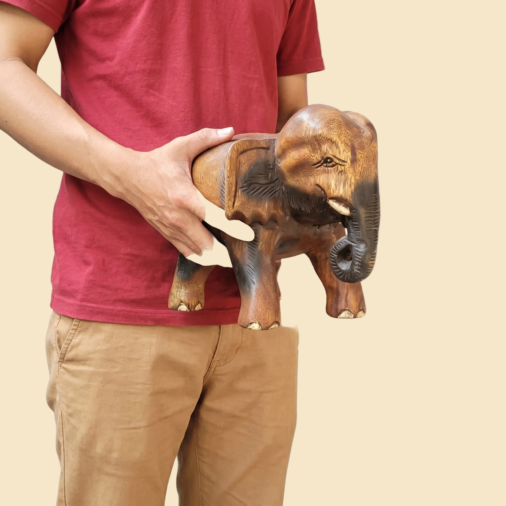 Handcrafted solid wooden elephant stool in dark brown