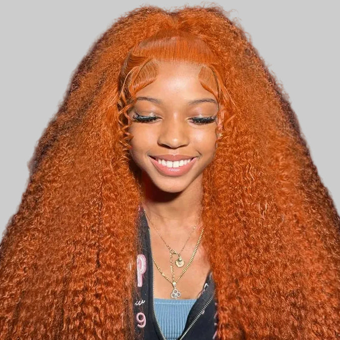 Black woman wearing long voluminous water wave ginger lace front wig