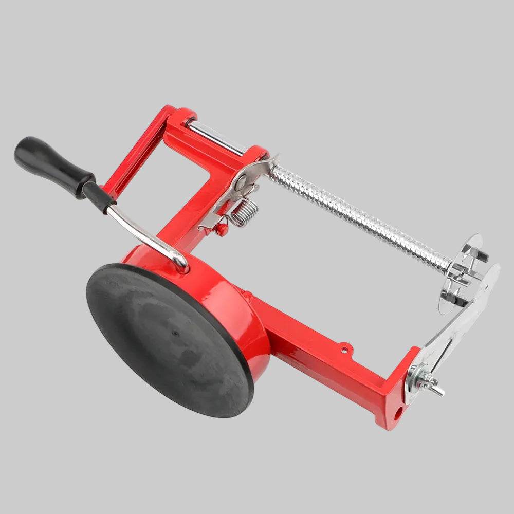 Red manual spiral potato slicer with stainless steel blade, creating twisted tornado fries on skewers.