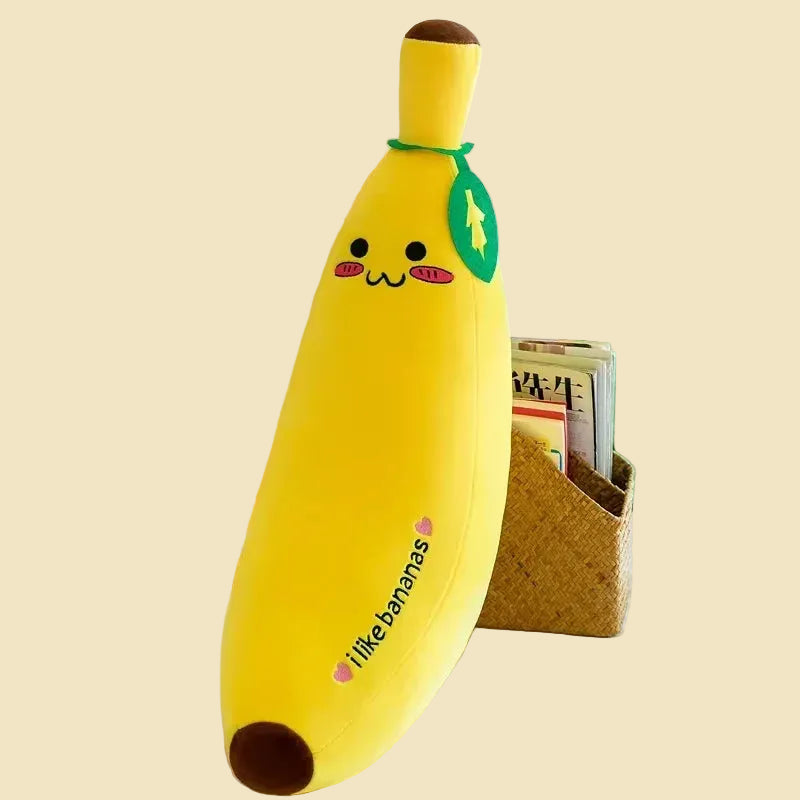 Three yellow giant banana plush body pillows in different sizes, featuring cute kawaii embroidered faces