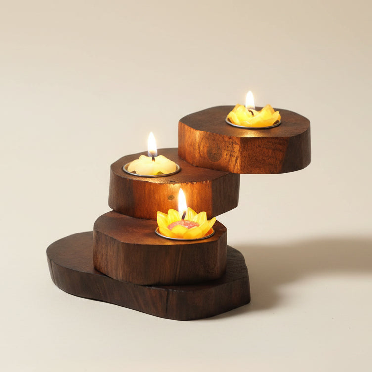 Hand-carved rustic wood candle holder featuring a multi-tier spiral design, ideal for a vintage dining table centerpiece and cozy home decor.