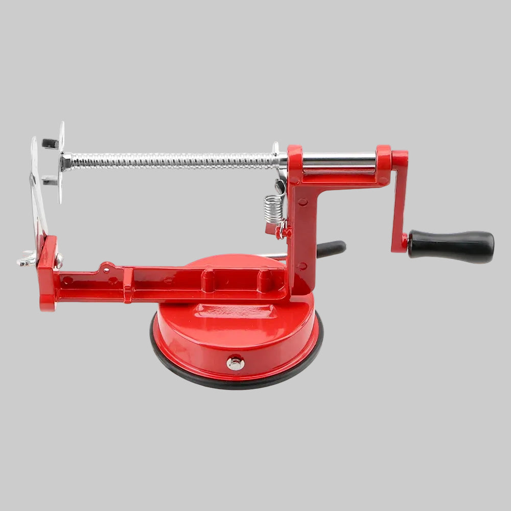Red manual spiral potato slicer with stainless steel blade, creating twisted tornado fries on skewers.