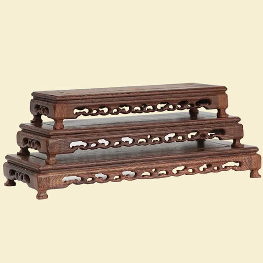 Hand-carved rectangular oriental wooden display stand made from premium chicken wing wood, with intricate details for displaying vases and teapots.