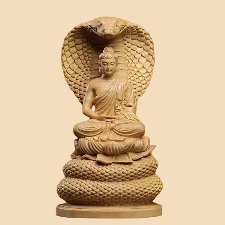 Hand-carved natural Cypress wood Shakyamuni Buddha statue protected by a Naga snake, perfect for Zen home decor and meditation spaces.