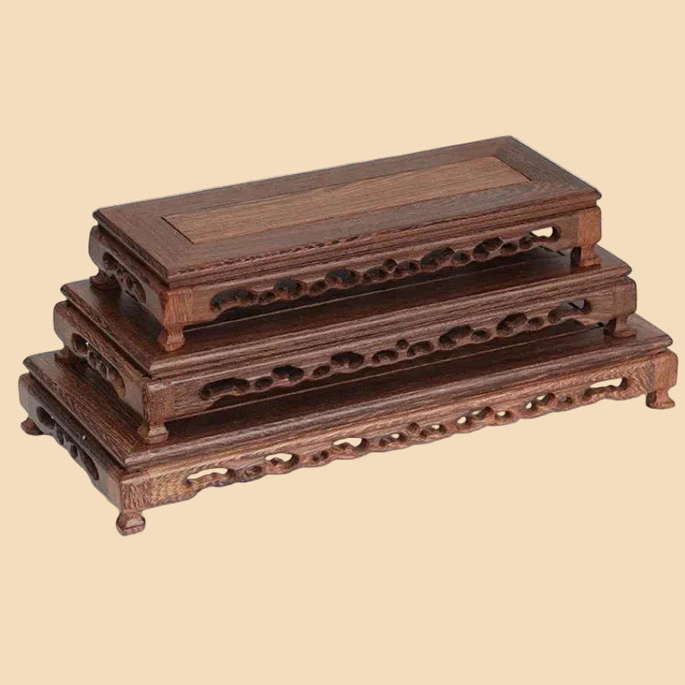 Hand-carved rectangular oriental wooden display stand made from premium chicken wing wood, with intricate details for displaying vases and teapots.
