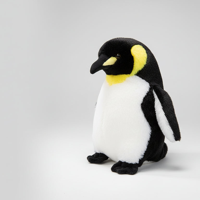 "Giant realistic Emperor penguin plush toy, soft stuffed animal body pillow held by woman to show large size."