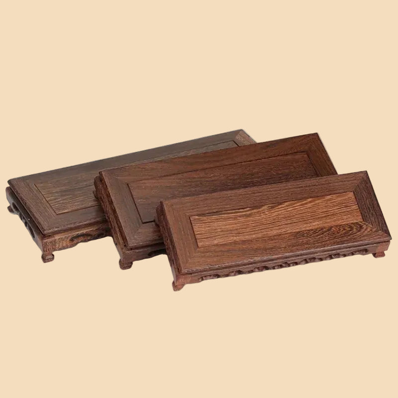 Hand-carved rectangular oriental wooden display stand made from premium chicken wing wood, with intricate details for displaying vases and teapots.