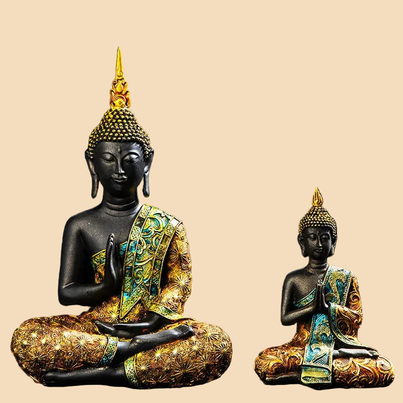 Large dark resin Thai Buddha statue in meditation pose, wearing an intricate gold and turquoise robe, perfect for Zen home decor.