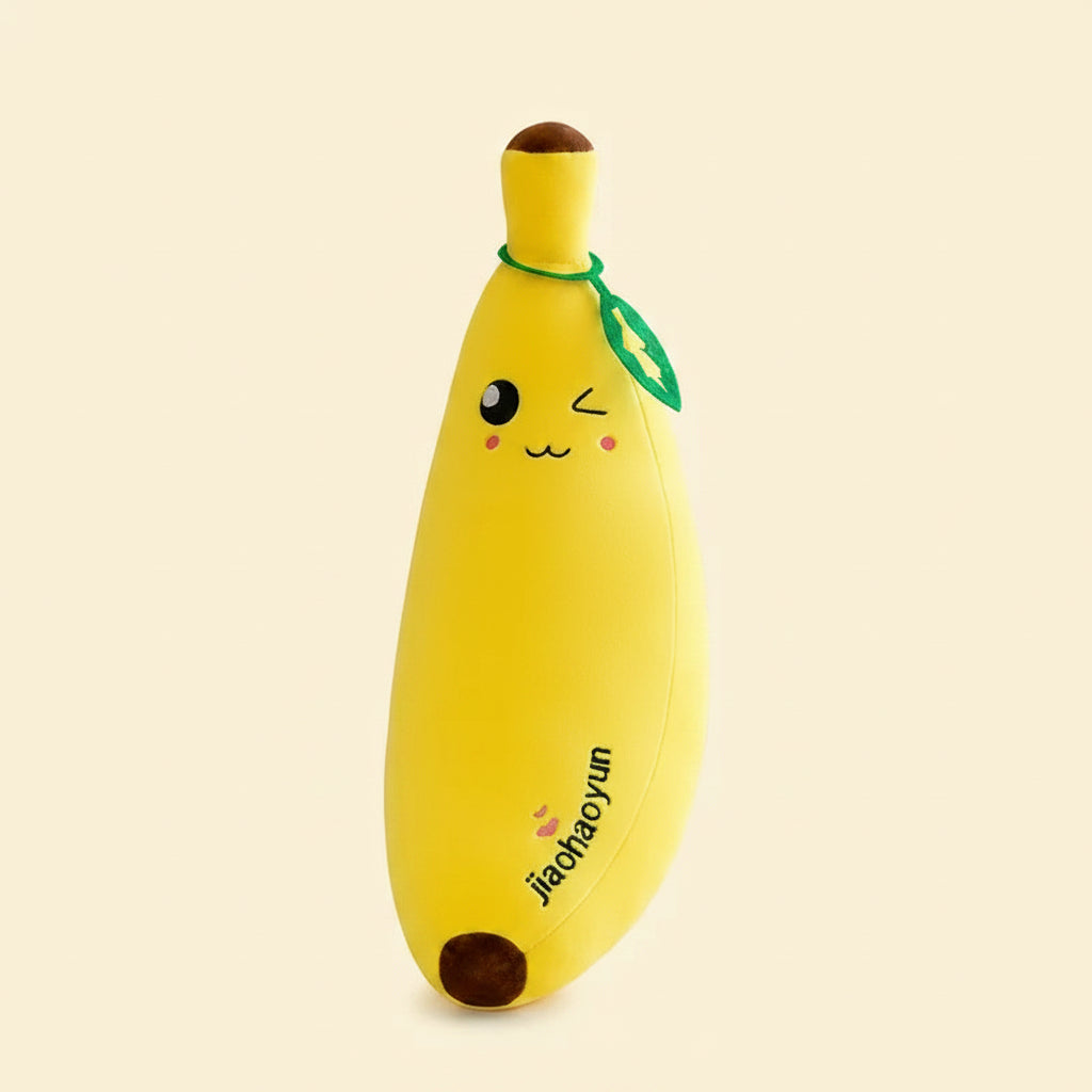 Three yellow giant banana plush body pillows in different sizes, featuring cute kawaii embroidered faces