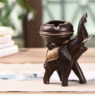 Elephant carved wooden ashtray